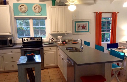Leeward Settlement Villa | A colourful, Caribbean retreat, a short walk to stunning Pelican Beach, Leeward.