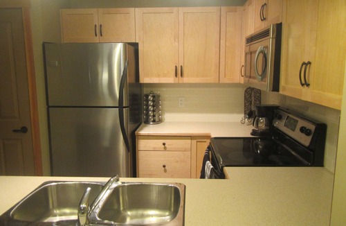 Canmore Condo | Mountain views, top floor, large deck, comfortable beds, AC