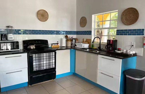 Providenciales Apartment | Pelican View #1 ground floor beachfront apartment
