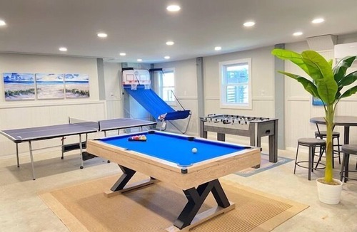 Colington Harbour House | Waterfront! Hot Tub, Game Room, Kayaks, SUPs, Theater Room, Fire Pit, Dogs OK!