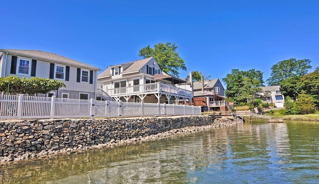 Afternoon Delight: Toast the beauty of the river from the waterfront deck in Beverly