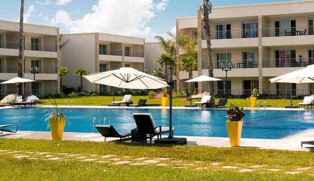 Beachfront apartment with swimming pools and beach access in Sidi rahal