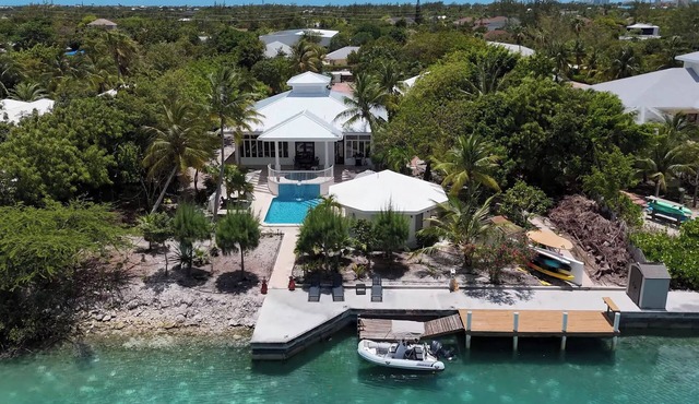 Canal-Front Villa in a Tropical Paradise in Leeward Settlement!