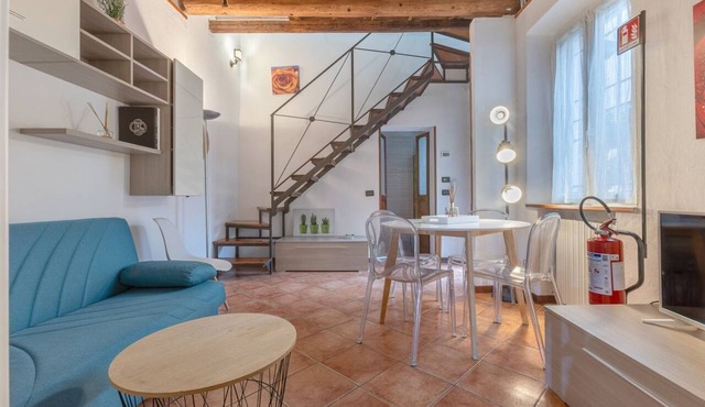 GuestHost - Cozy and bright 70 sqm apartment, structured on two levels and located on the ground floor of a renovated period building. Perfect for 5 people, the accommodation enjoys an ideal location to easily reach any monument in the historic city cent in Ferrara