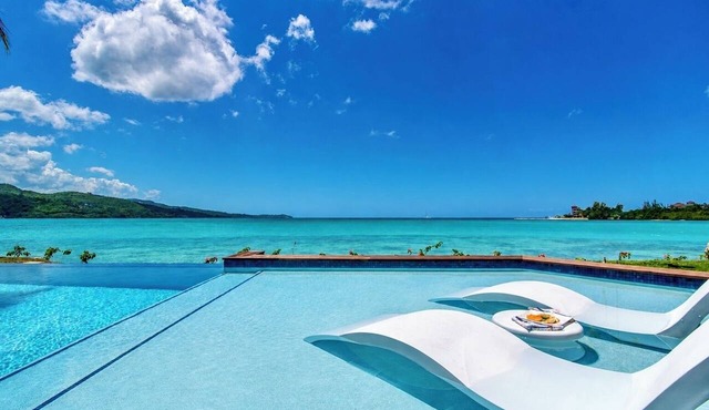 Oceanfront Paradise staffed 4 bedroom Home Views Pool Beach Access Gym Tennis in Montego Bay