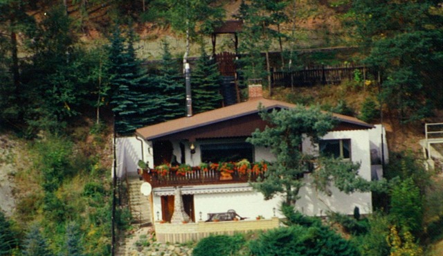 On the edge of the forest with a beautiful panoramic view of 2 valleys in Unterweißbach