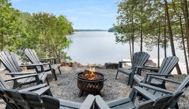 Private 235 ft waterfront retreat with over an acre on Lake Rosseau in Rosseau
