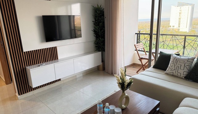 Stunning Park & Beach View - Peaceful Retreat Steps Away in Âïn-Harrouda