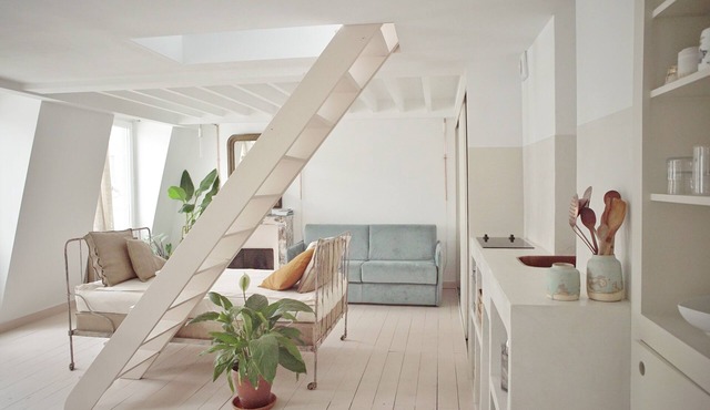Summer light: architect’s nest between rooftops in Paris