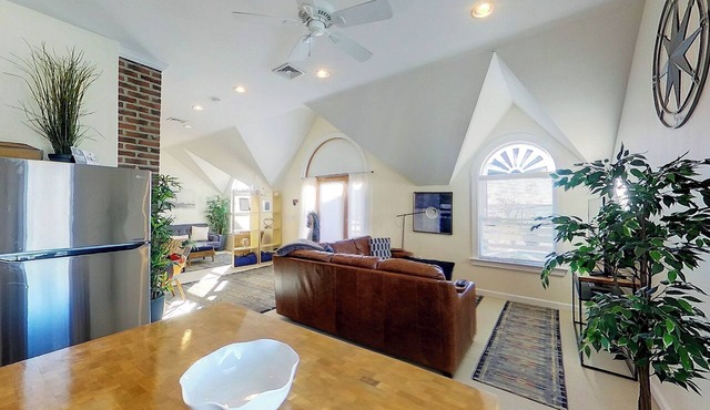 Unwind in harbor luxury at this sophisticated studio in Newport's Yachting Village! Cozy queen bed + pull-out sofa bed, fully stocked kitchen, huge deck with sunset harbor views, mini-split AC, TV, off-street parking. Steps to marinas, Thames Street in Newport