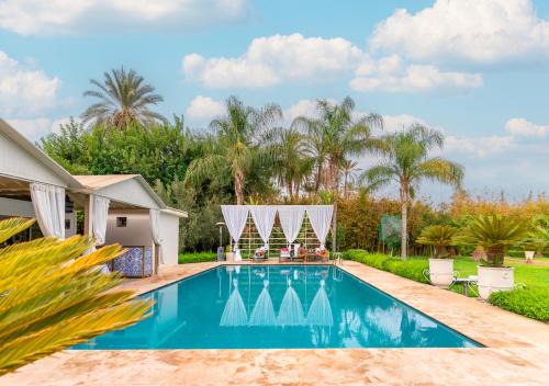 Villa de Luxe à Marrakech avec Piscine & 7 Suites in Marrakesh