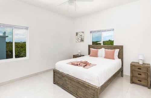 Cooper Jack Bay Settlement Villa | New Unique Villa Blue Top! 2 Bedroom Waterfront